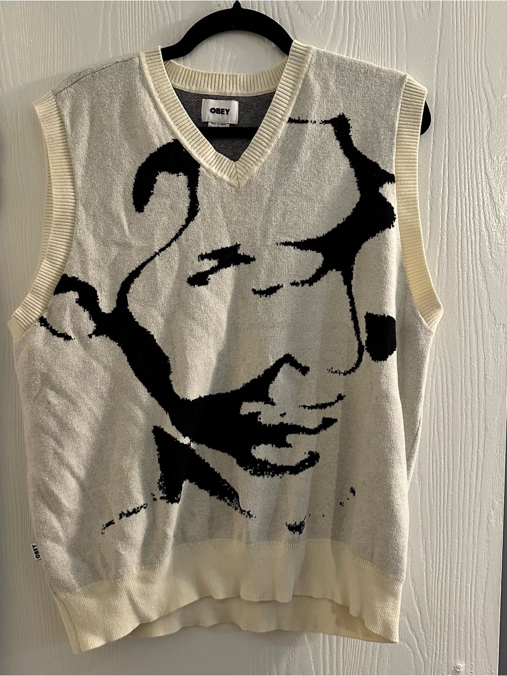 Obey Cream V-Neck Sweater Vest with Black Graphic Face
